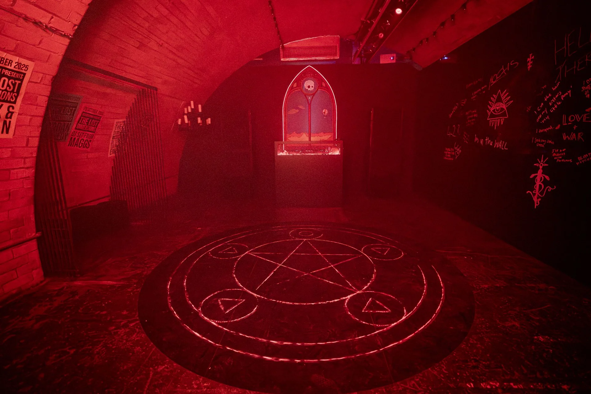 Satanic summoning room — deep red wash over pentagram floor inlay, Beavertown Lost Dimensions